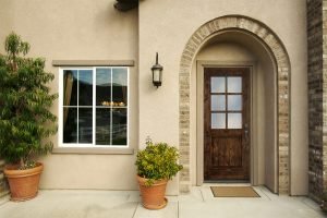 a newly constructed modern american home doorway and patio