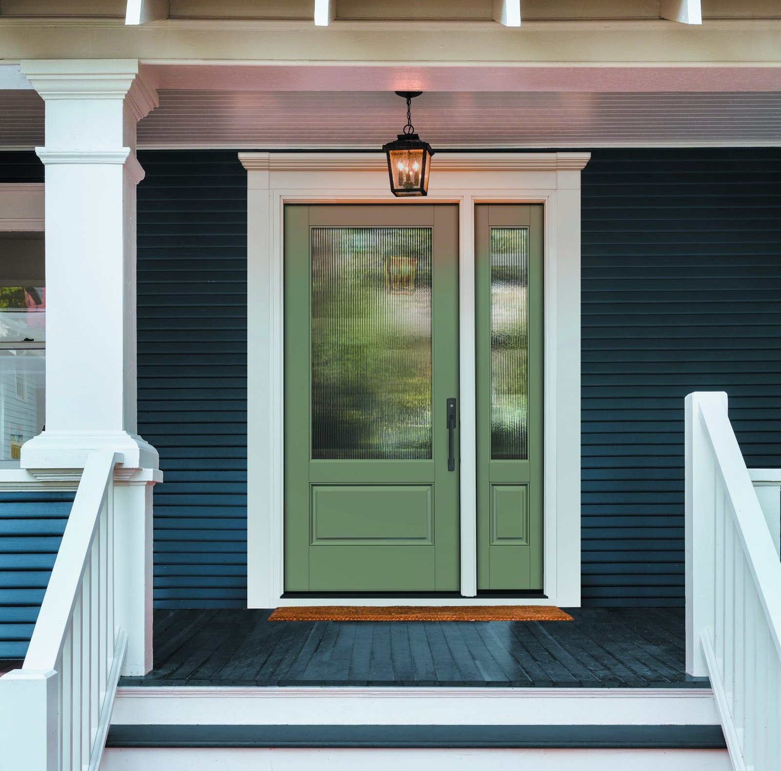 Blue front door with classic entry and wooded steps of newly renovated home